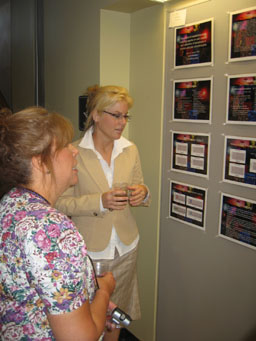 Phyllis Braun views Caitlin Bickhart's project