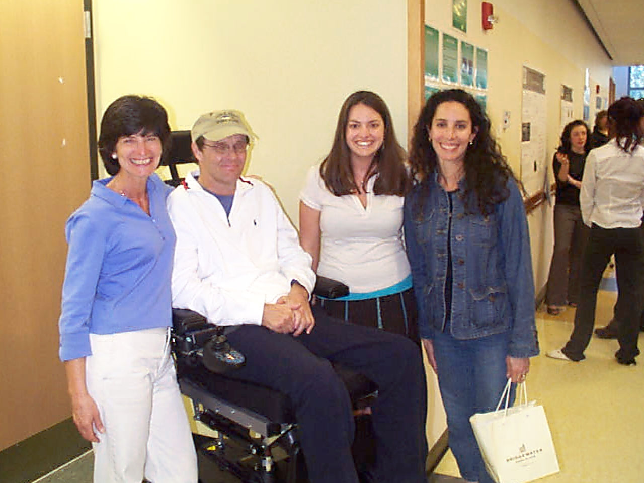 Nicole Carlson with her parents and Shelley Phelan.  Nicole describes research to Professor Geoff Church