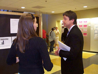 Jessica Curtis presents her math project to Dean Timothy Snyder