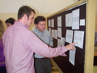 Professors Matt Kubasik and Jen Klug discuss student's research