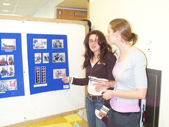 Jessica Kurose '07 describes her Droplet  Physics project to Meghan Dancho '06