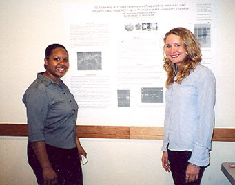 LaQueta Hudson '07 and Alexandra Wilson '07 with their project, on PCR cloning and overexpression of a putative necrosis- and ethylene-inducing (NEP) gene from the plant symbiont Frankia