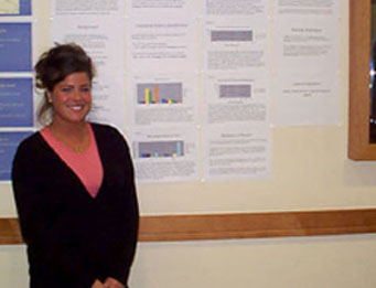 Pryce Gaynor '07 describes her biology research to Dr. Biardi