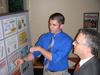 George Lisi presenting to William Weitzer and with Dr. Harper-Leatherman